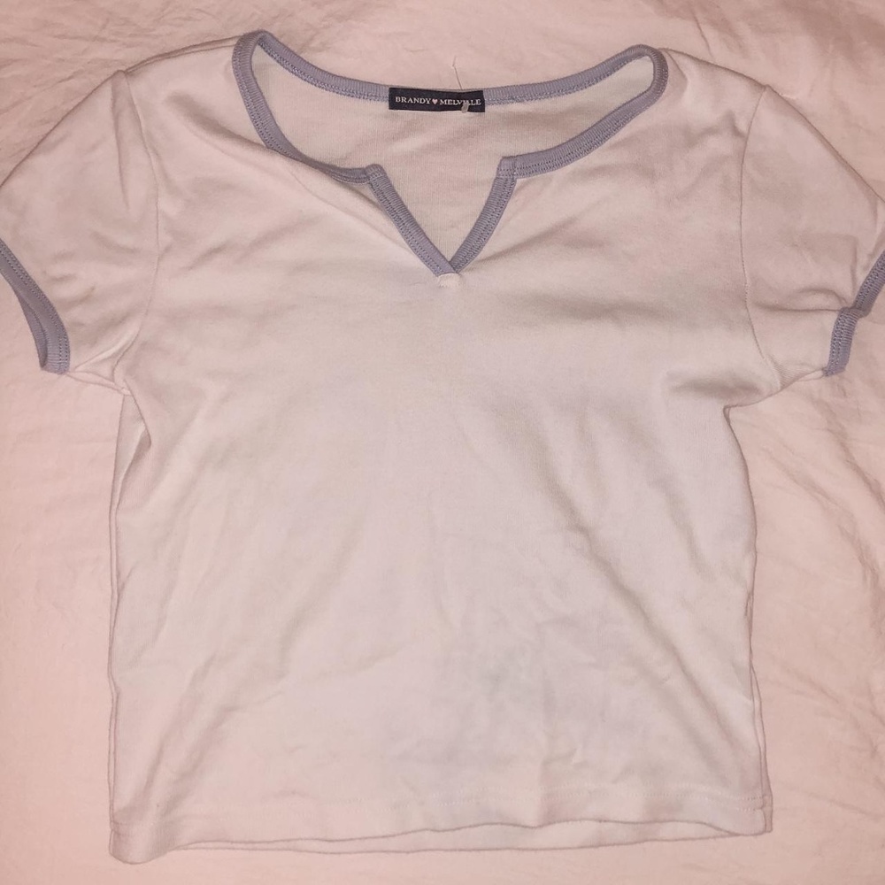brandy Melville Ashlyn V notch top in white with blue lining!!
